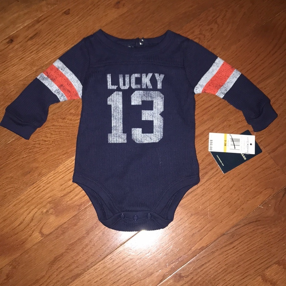 NWT Lucky Brand onesie 0-3 months